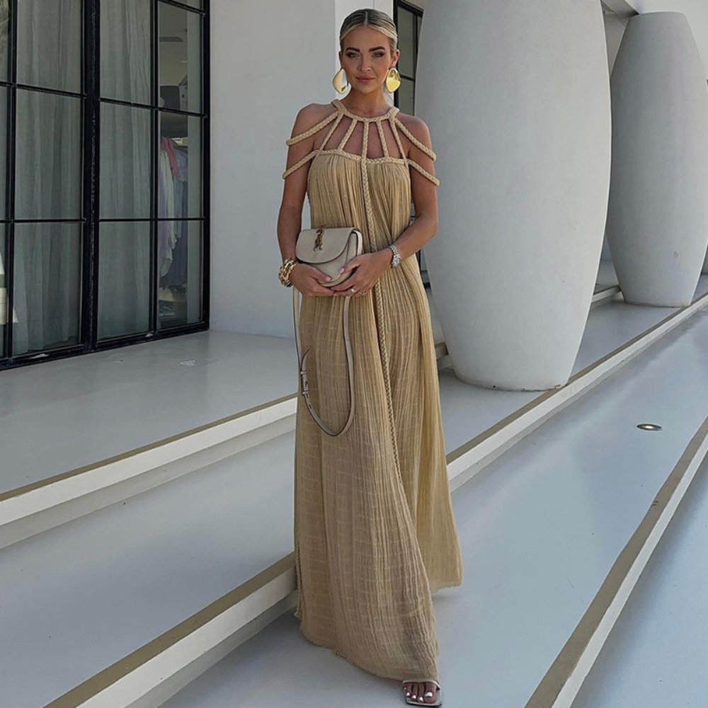 Beige pleated maxi dress with braided halter neckline front view