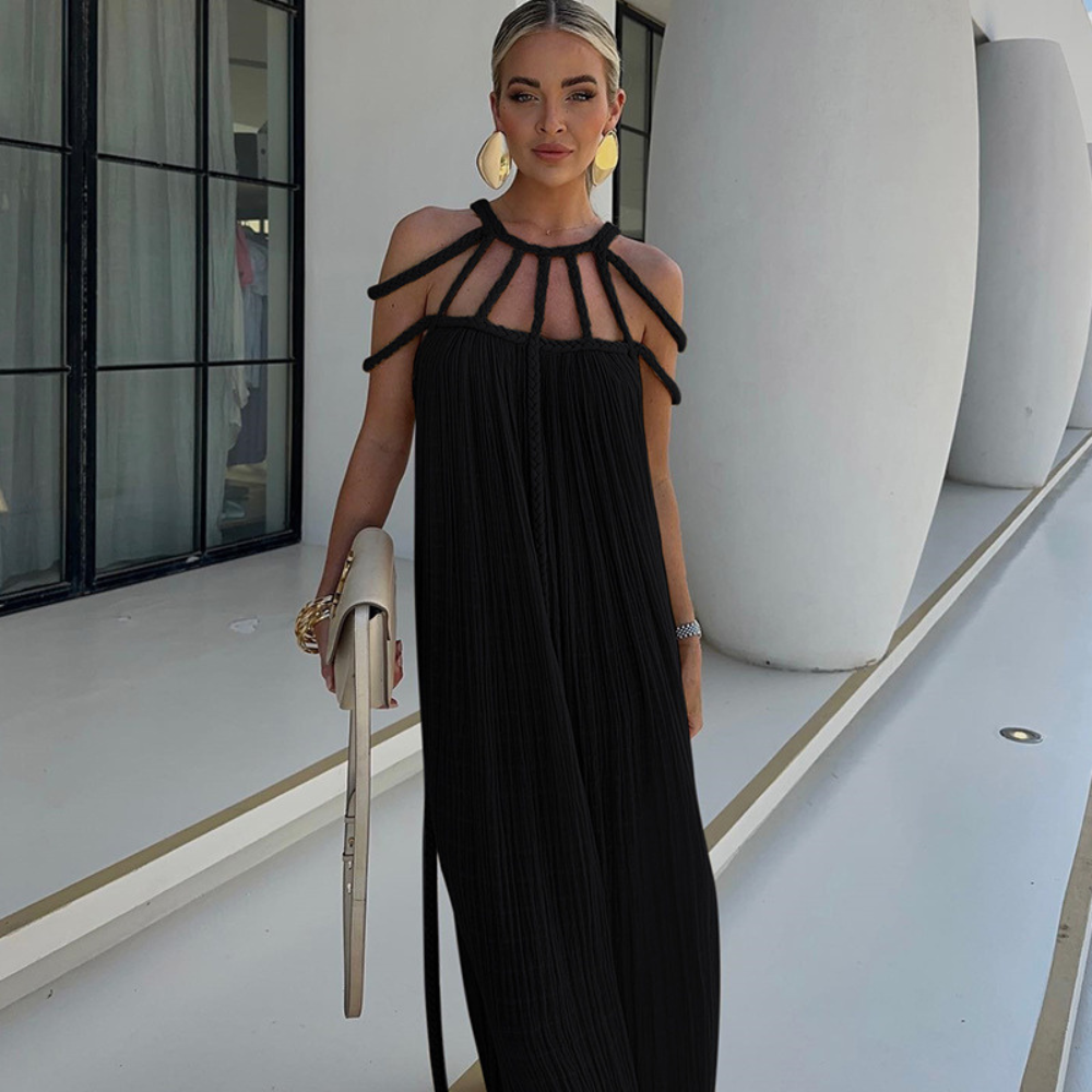 Black pleated maxi dress with braided cold-shoulder neckline