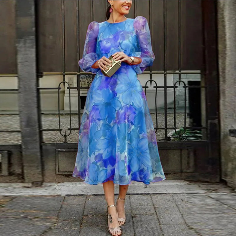 Blue floral midi dress with long puff sleeves and fitted waist for women