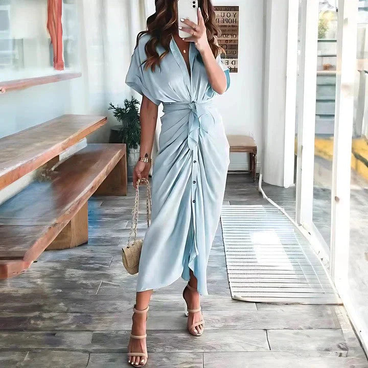 Light blue wrap midi dress with tie waist and button-down front