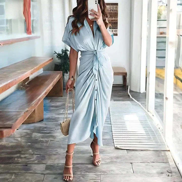 Light blue wrap midi dress with tie waist and button-down front