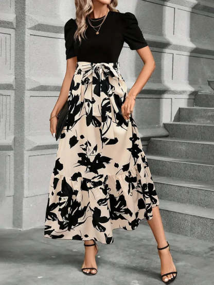 Black puff sleeve bodice with cream botanical print maxi skirt and tiered hem