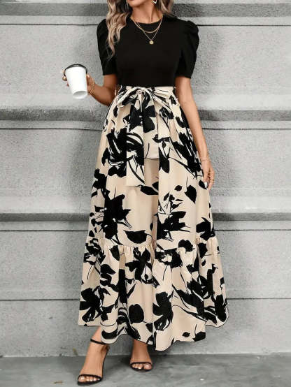 Cream maxi dress with black floral print and ruffled hemline for wedding guest
