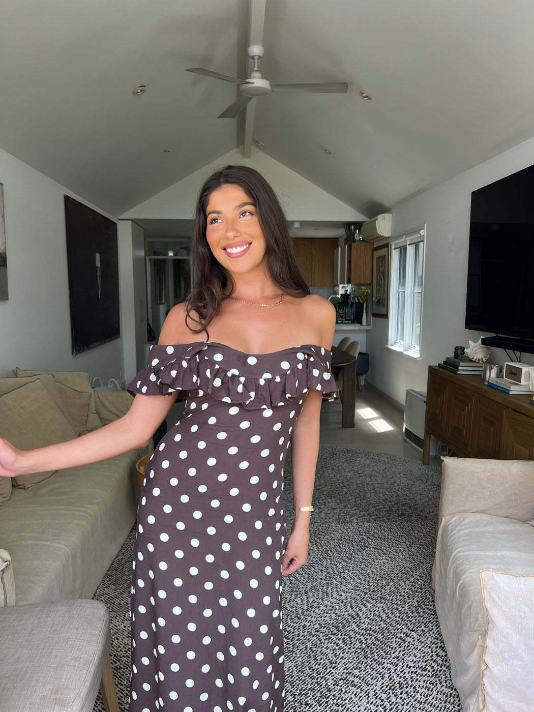 Off-shoulder brown polka dot maxi dress with ruffled neckline detail