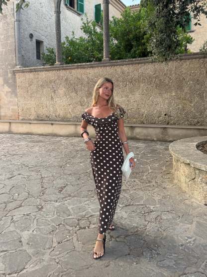 Full-length brown polka dot maxi dress with ruffled off-shoulder top