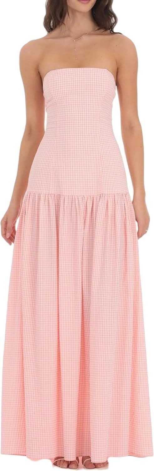 Full-length view of pink gingham strapless maxi dress with flowing gathered skirt