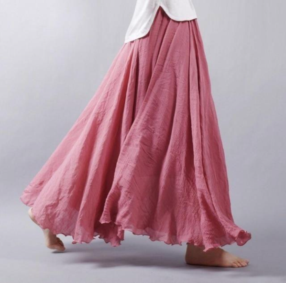 Mauve pink pleated maxi skirt showing rich color and full volume