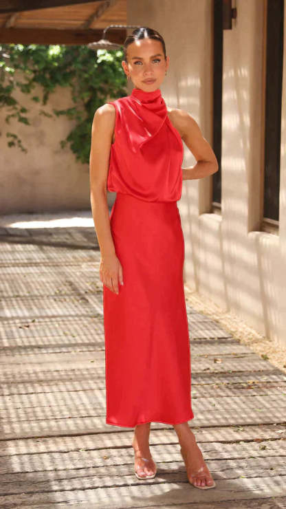 Bright red draped halter midi dress with flowing silhouette