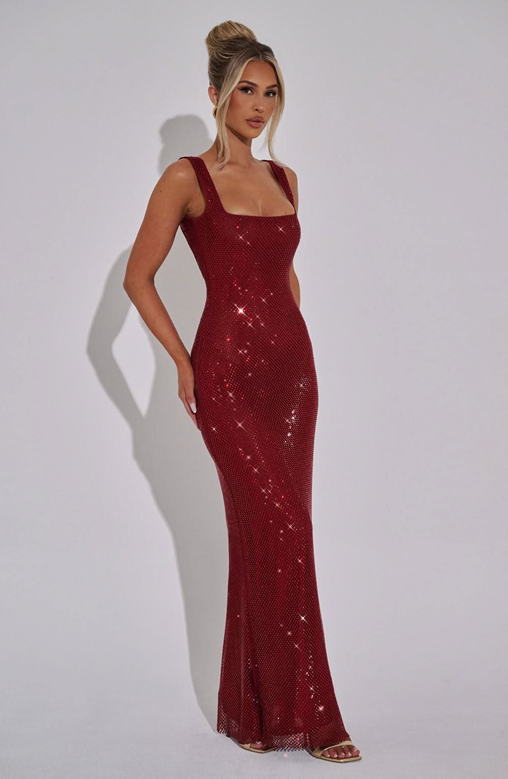 Burgundy sequin maxi dress with square neckline and sleeveless cut
