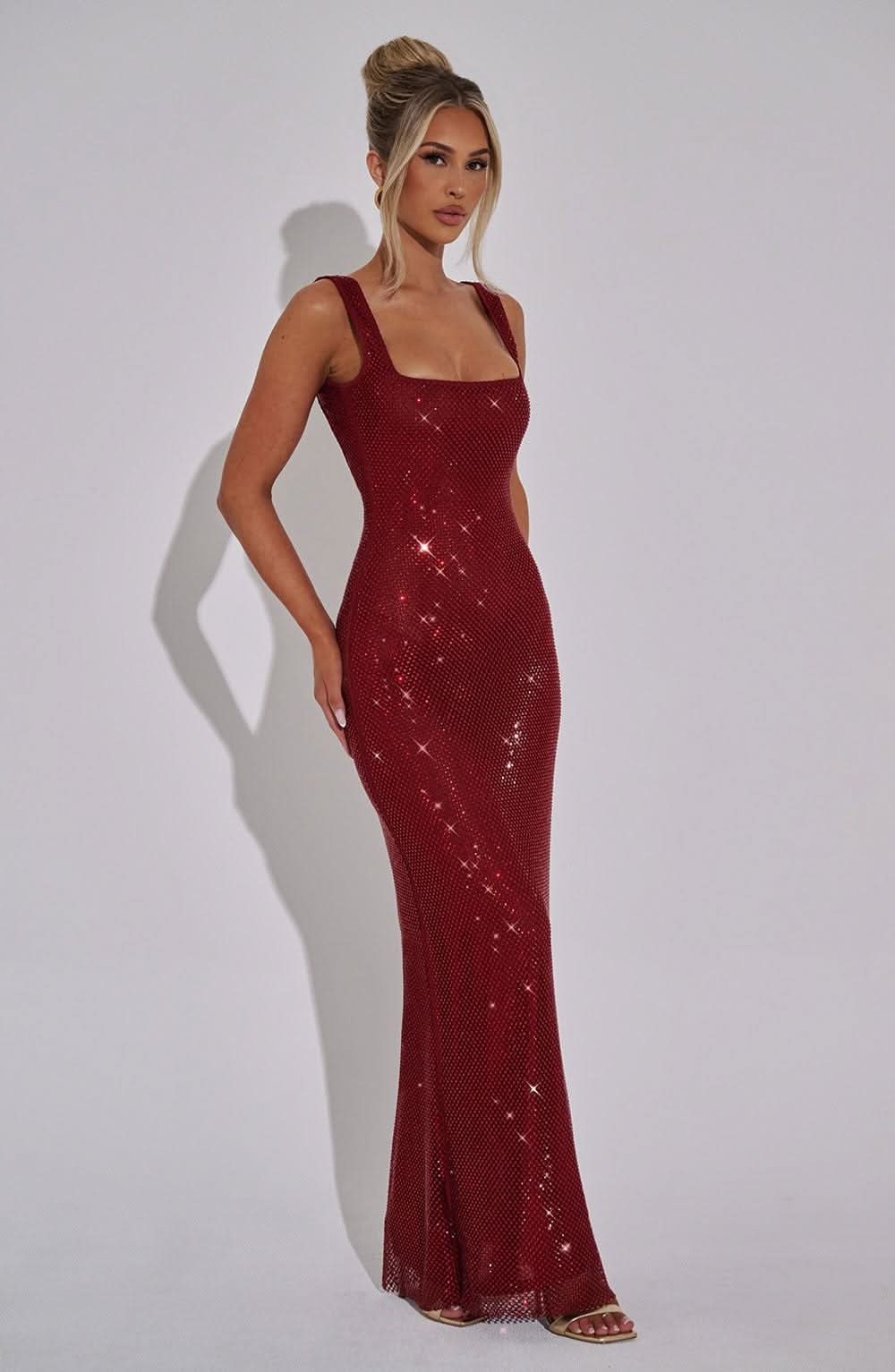 Burgundy sequin maxi dress with square neckline and sleeveless cut