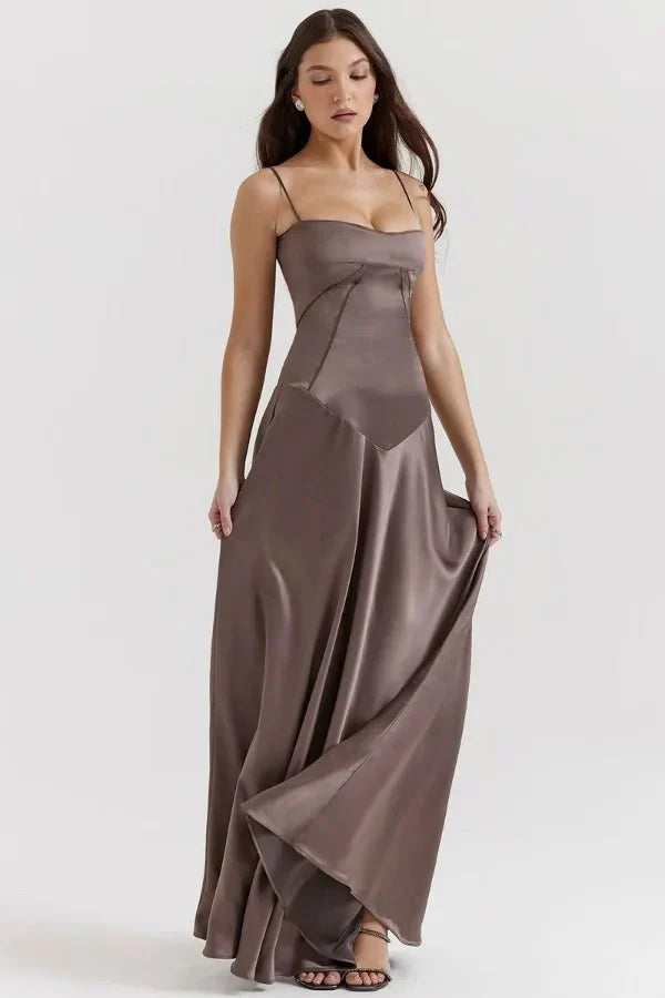 Taupe maxi dress with structured corset bodice and draped skirt detail