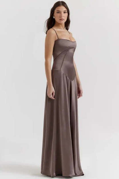 Side view of taupe corset maxi dress with asymmetrical bodice design