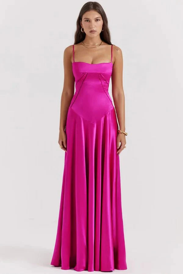 Magenta corset maxi dress with square neckline and draped skirt front view