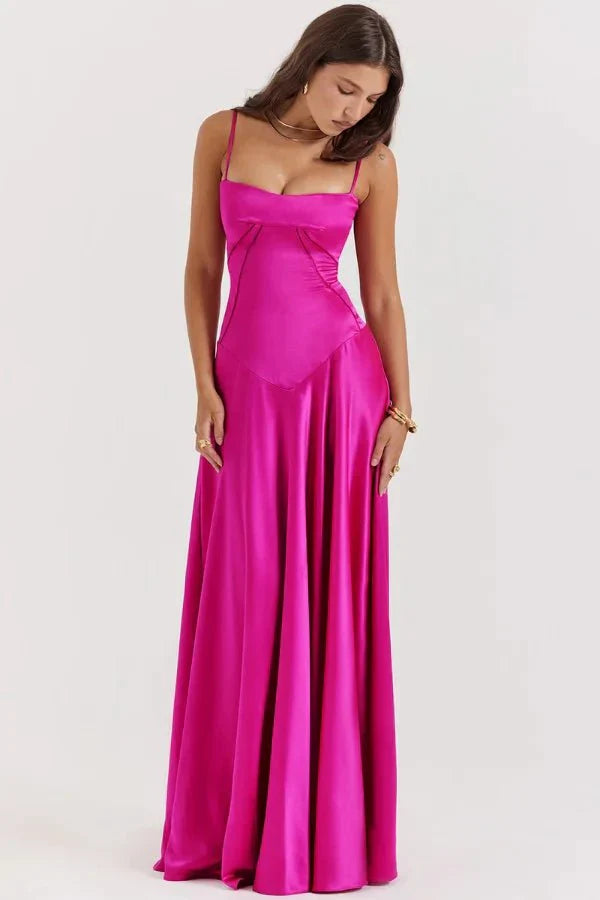 Fuchsia satin corset maxi dress with ruched waist and flowing hem