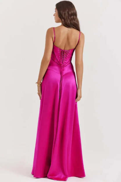 Magenta corset maxi dress outdoor shot showing draped skirt and structured bodice