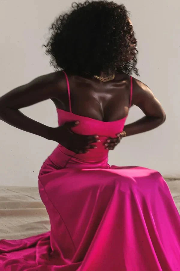 Back view of magenta corset maxi dress showing lace-up corset detail