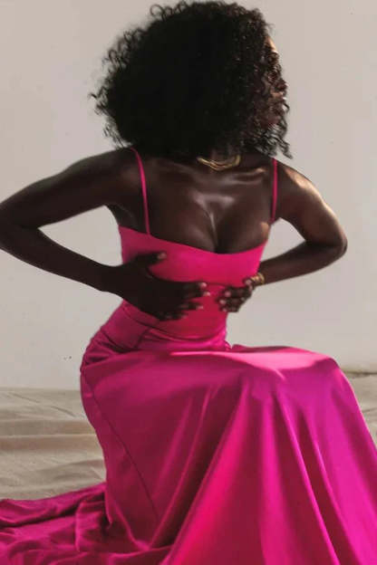 Back view of magenta corset maxi dress showing lace-up corset detail