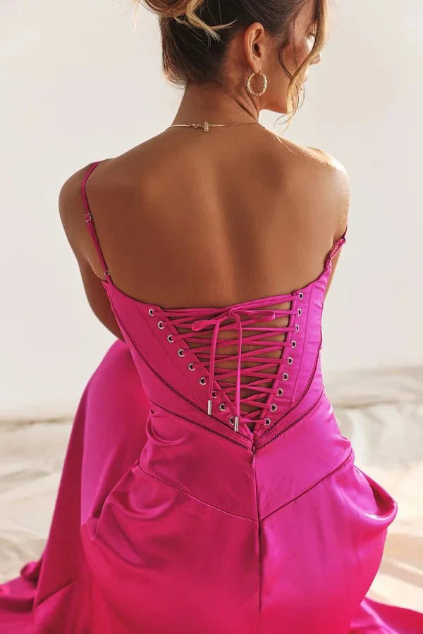 Back view of pink corset maxi dress with lace-up corset closure