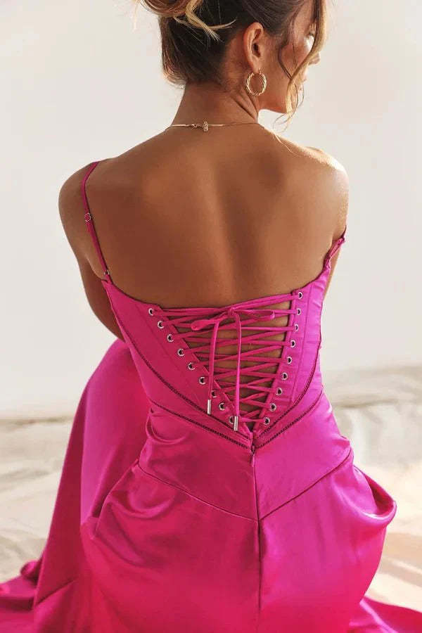 Back view of pink corset maxi dress with lace-up corset closure