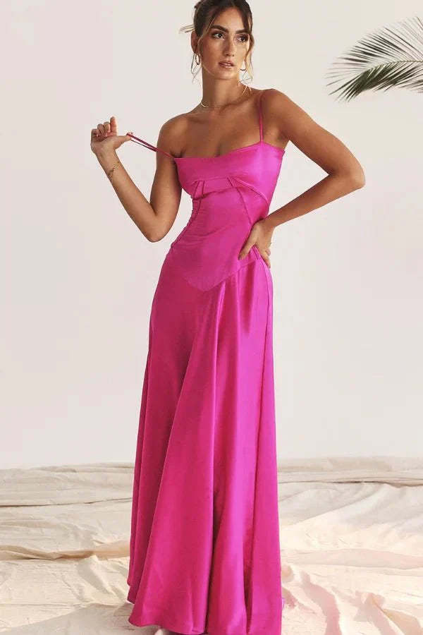 Magenta corset maxi dress with sweetheart neckline and flowing skirt