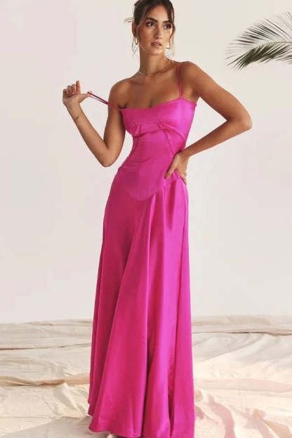 Magenta corset maxi dress with sweetheart neckline and flowing skirt
