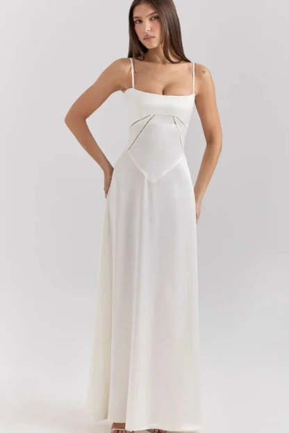 Cream corset maxi dress with spaghetti straps and structured bustier bodice