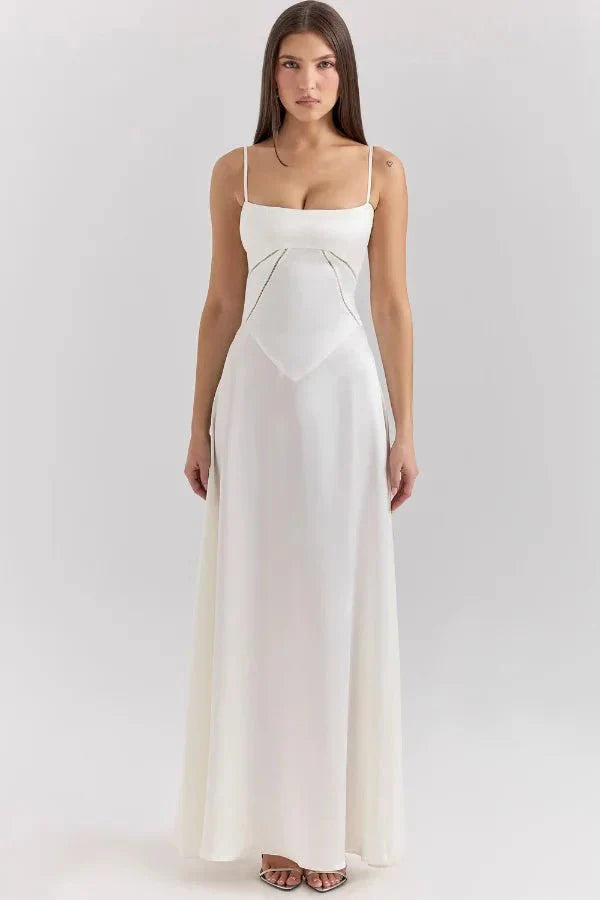 Cream corset maxi dress front view with structured sweetheart neckline