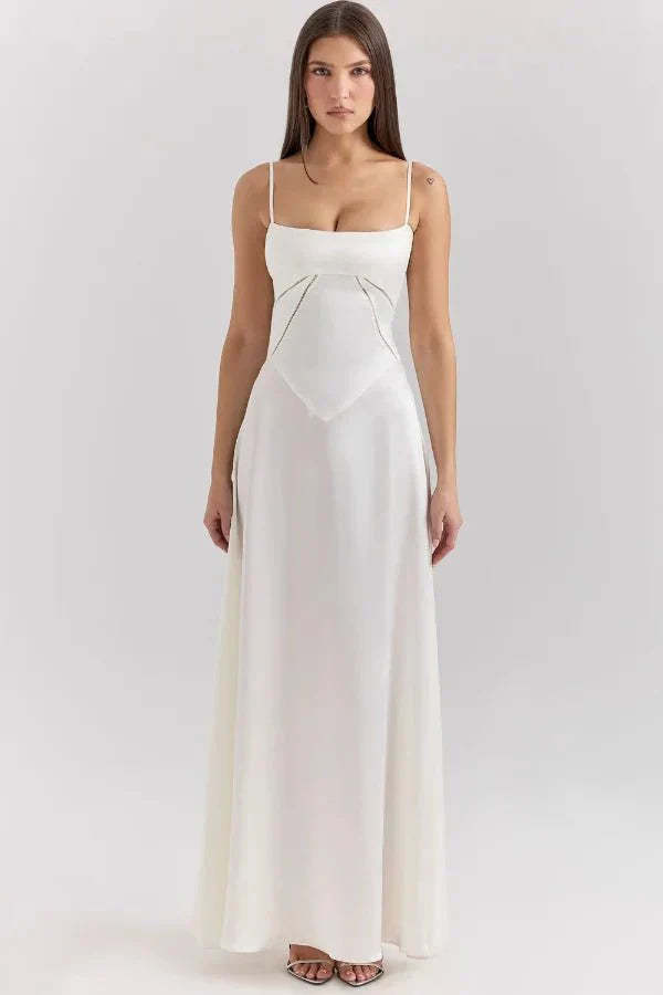 Cream corset maxi dress front view with structured sweetheart neckline
