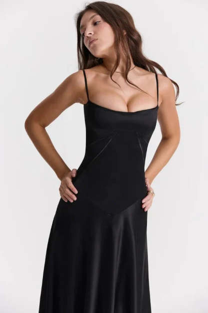 Black corset maxi dress with spaghetti straps and curved waist