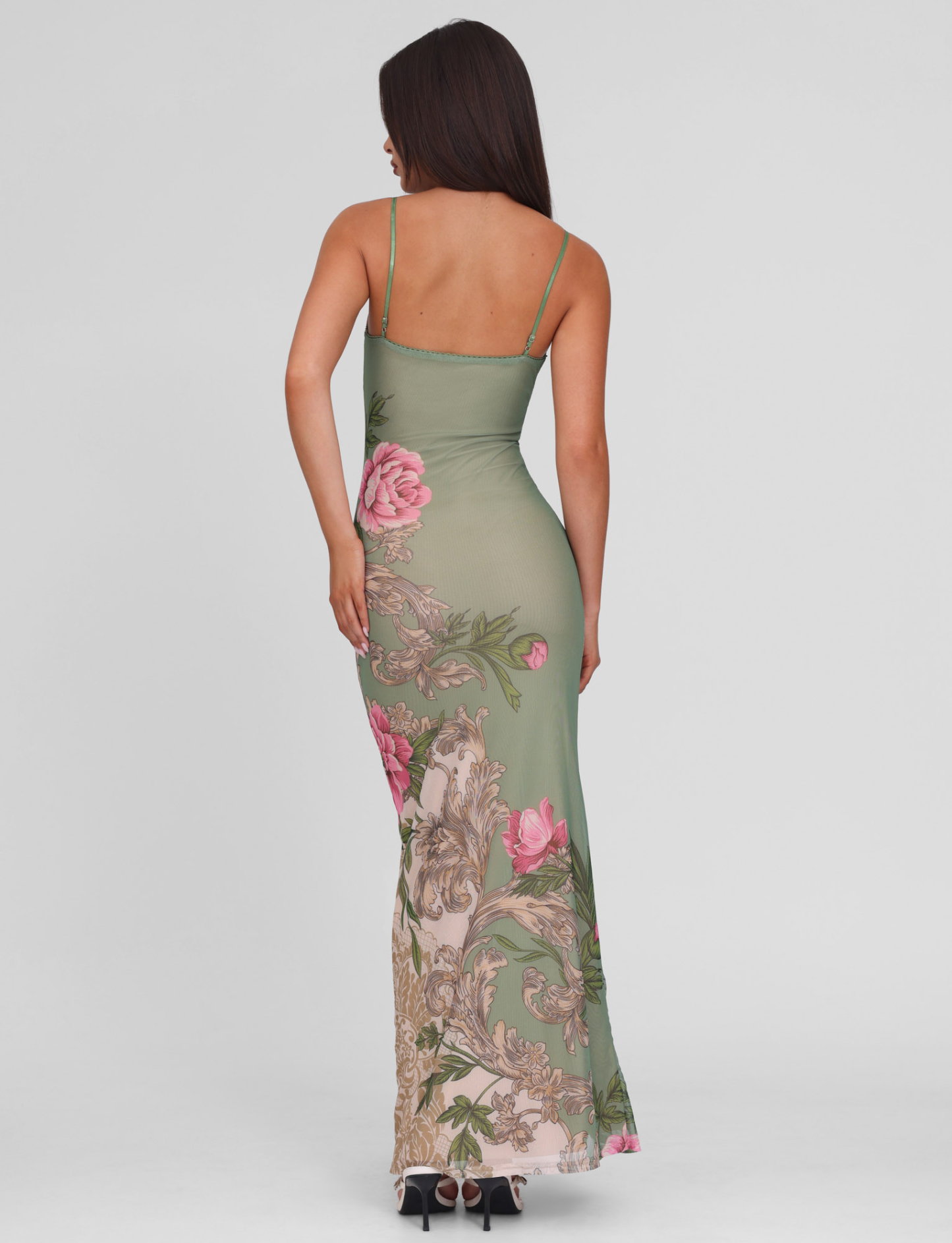 Back view of floral maxi dress showing spaghetti straps and pink rose print