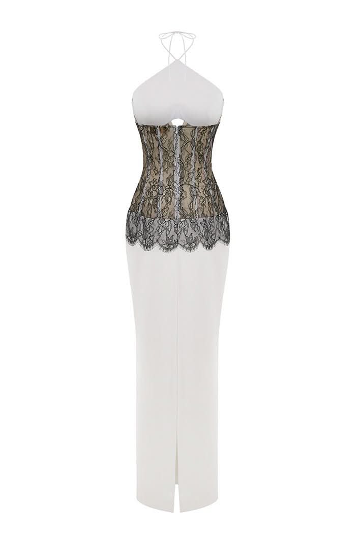 Back view of lace maxi dress showing black lace panel and center slit