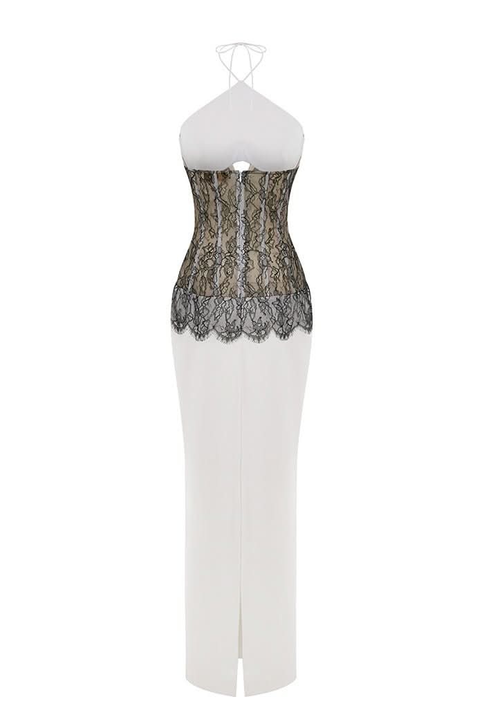 Back view of lace maxi dress showing black lace panel and center slit