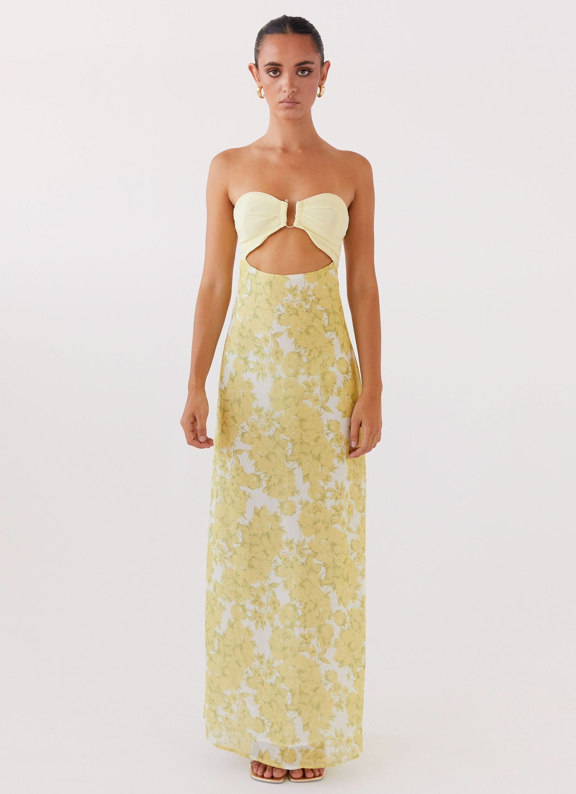 Strapless yellow floral maxi dress with front cutout detail