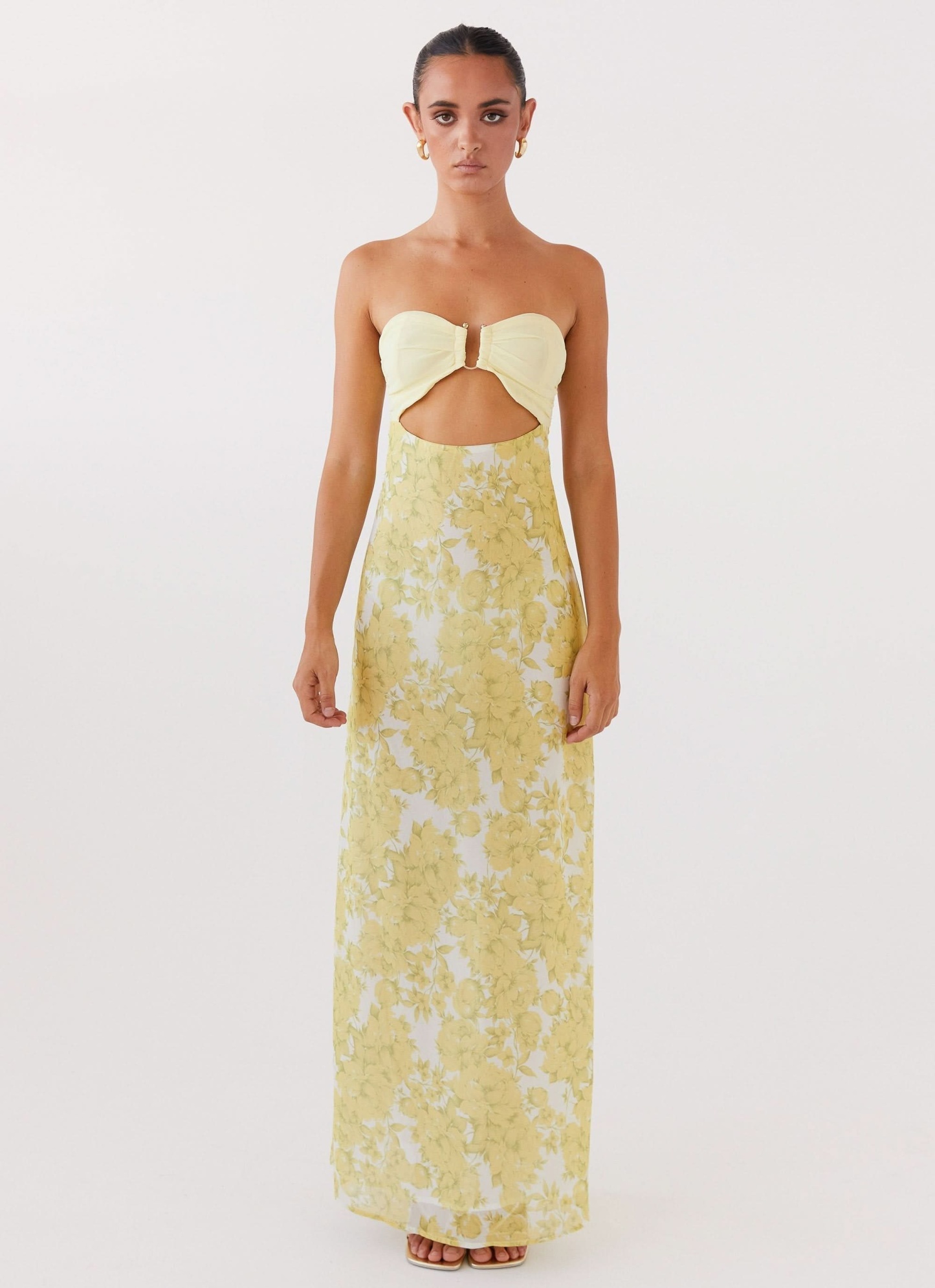 Strapless yellow floral maxi dress with front cutout detail