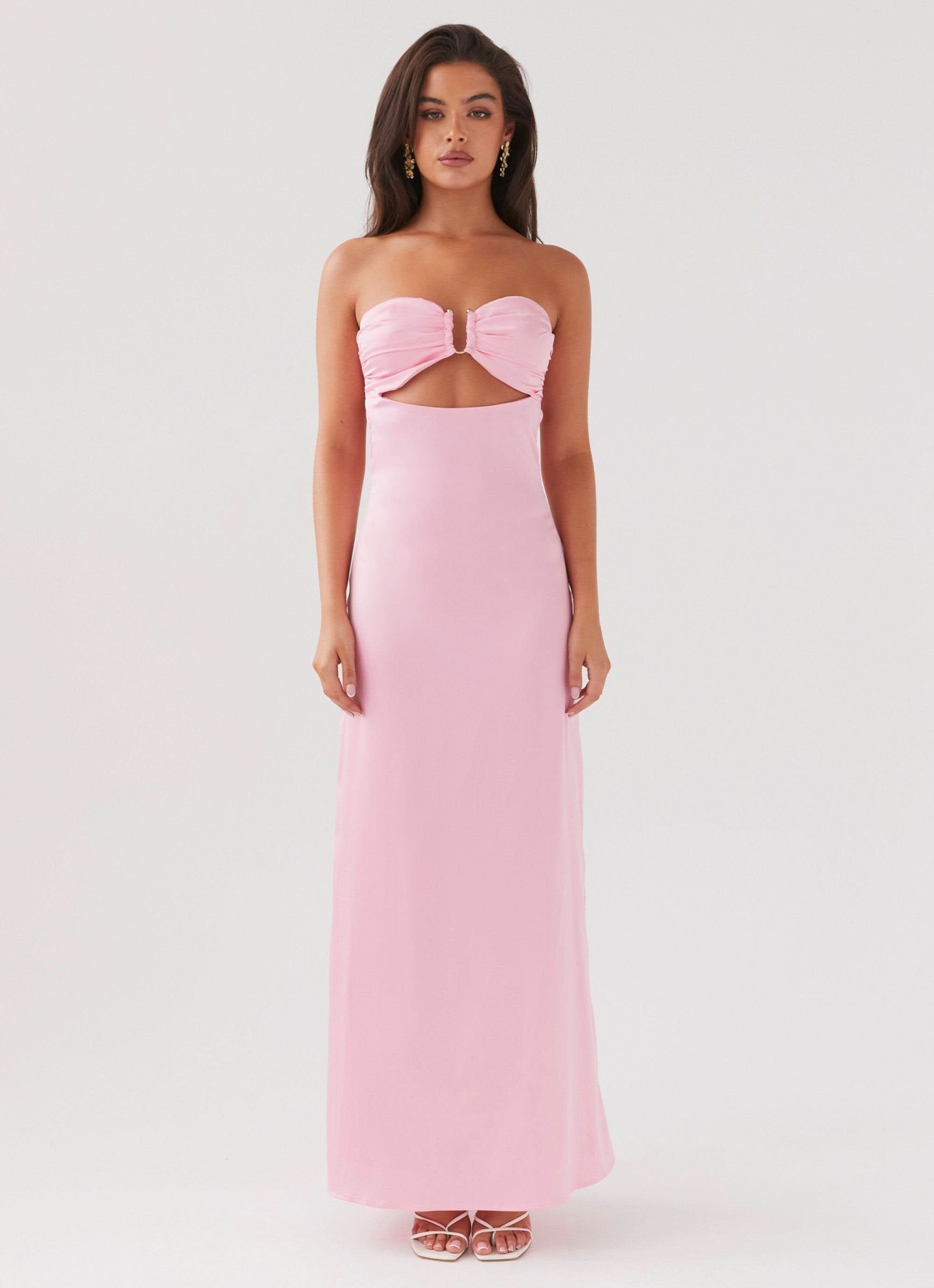 Pink ruched cutout maxi dress with strapless neckline