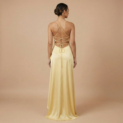 Back view of yellow maxi dress with lace-up strappy back detail