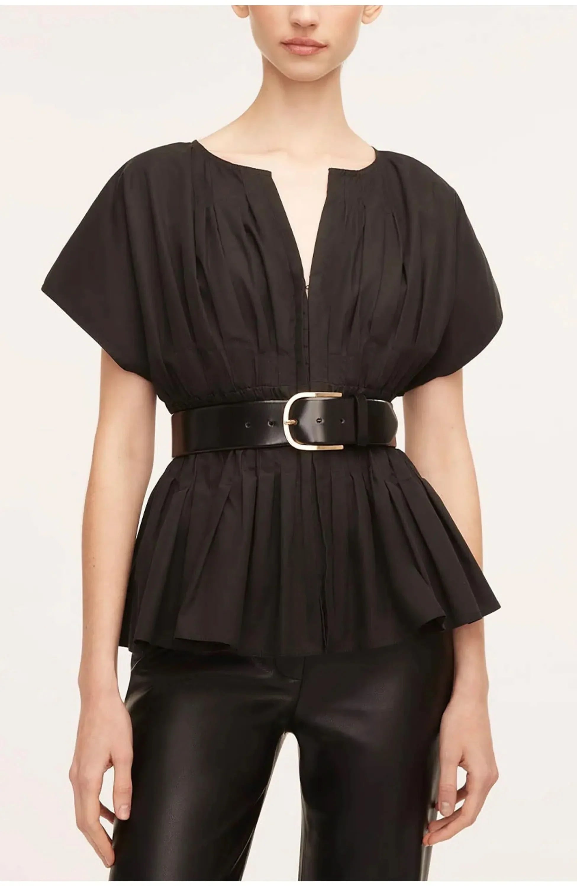 Black pleated peplum blouse with split neckline and short puffed sleeves for women