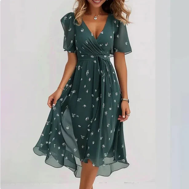 Forest green wrap midi dress with small white leaf pattern and tie waist