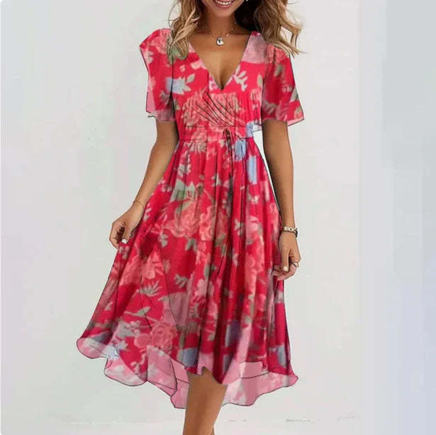 pink wrap midi dress with gray floral design and flutter sleeves
