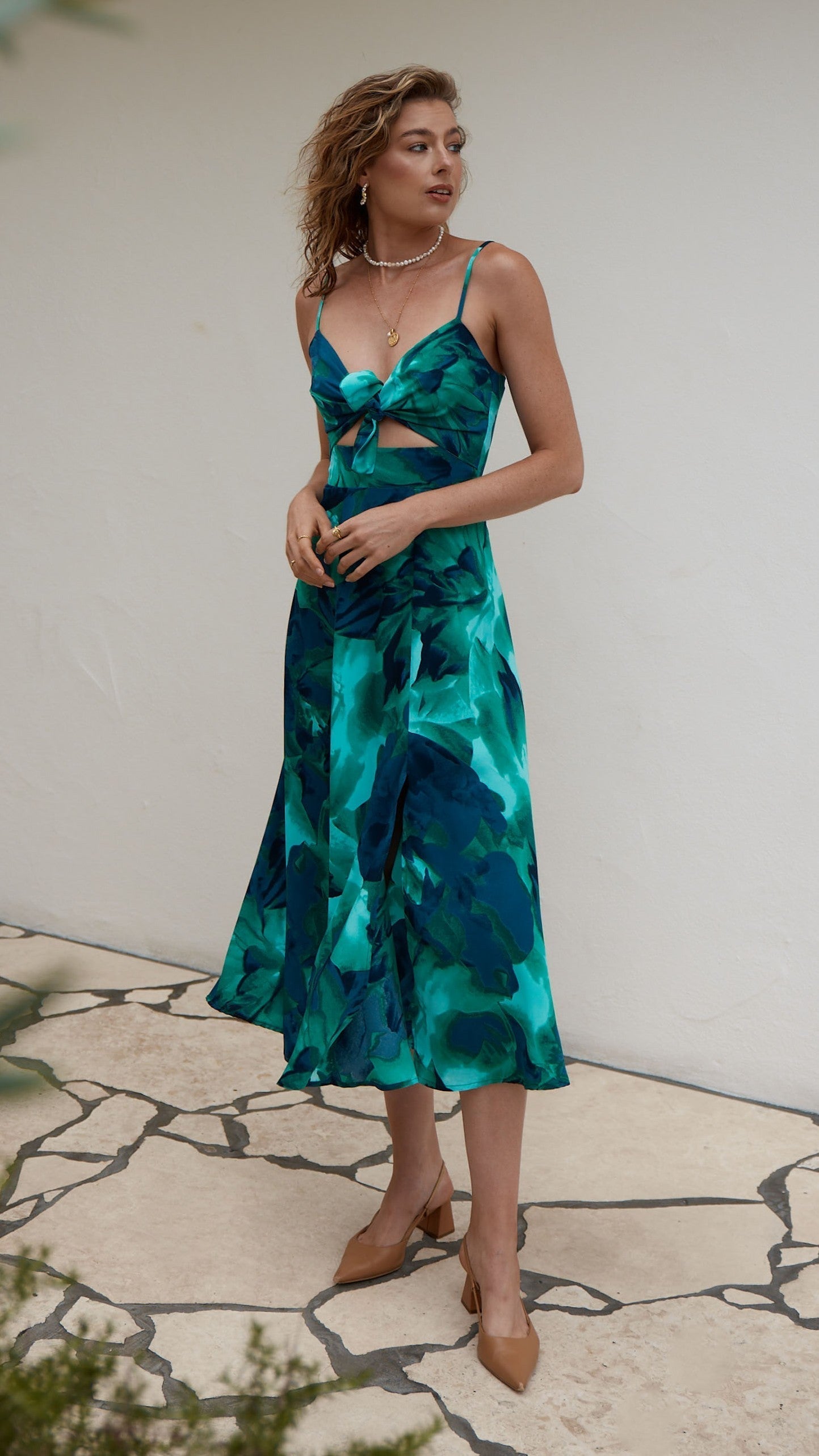 Teal and navy abstract print cutout midi dress with twisted front detail and spaghetti straps