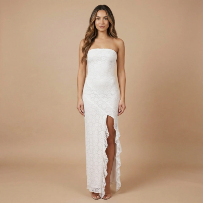 White lace strapless maxi dress with asymmetrical ruffle hem and slit