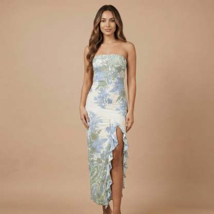 Strapless maxi dress with blue and cream floral print and asymmetrical ruffle hem