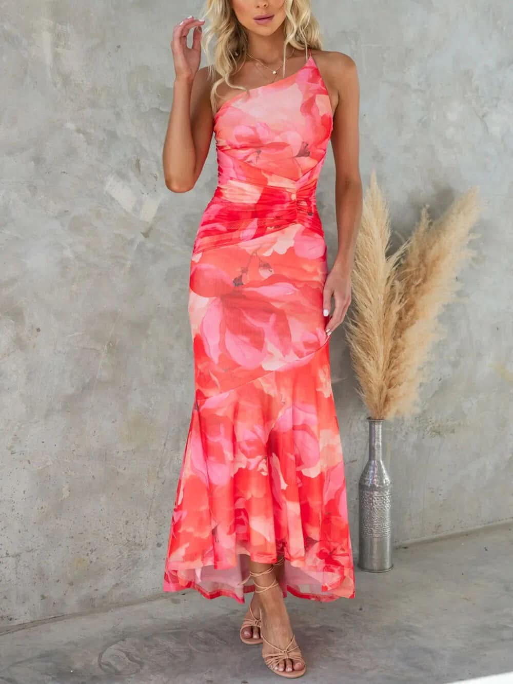 Coral pink floral ruched maxi dress with one-shoulder neckline, front view
