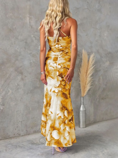 Back view golden yellow floral ruched maxi dress flowing hem