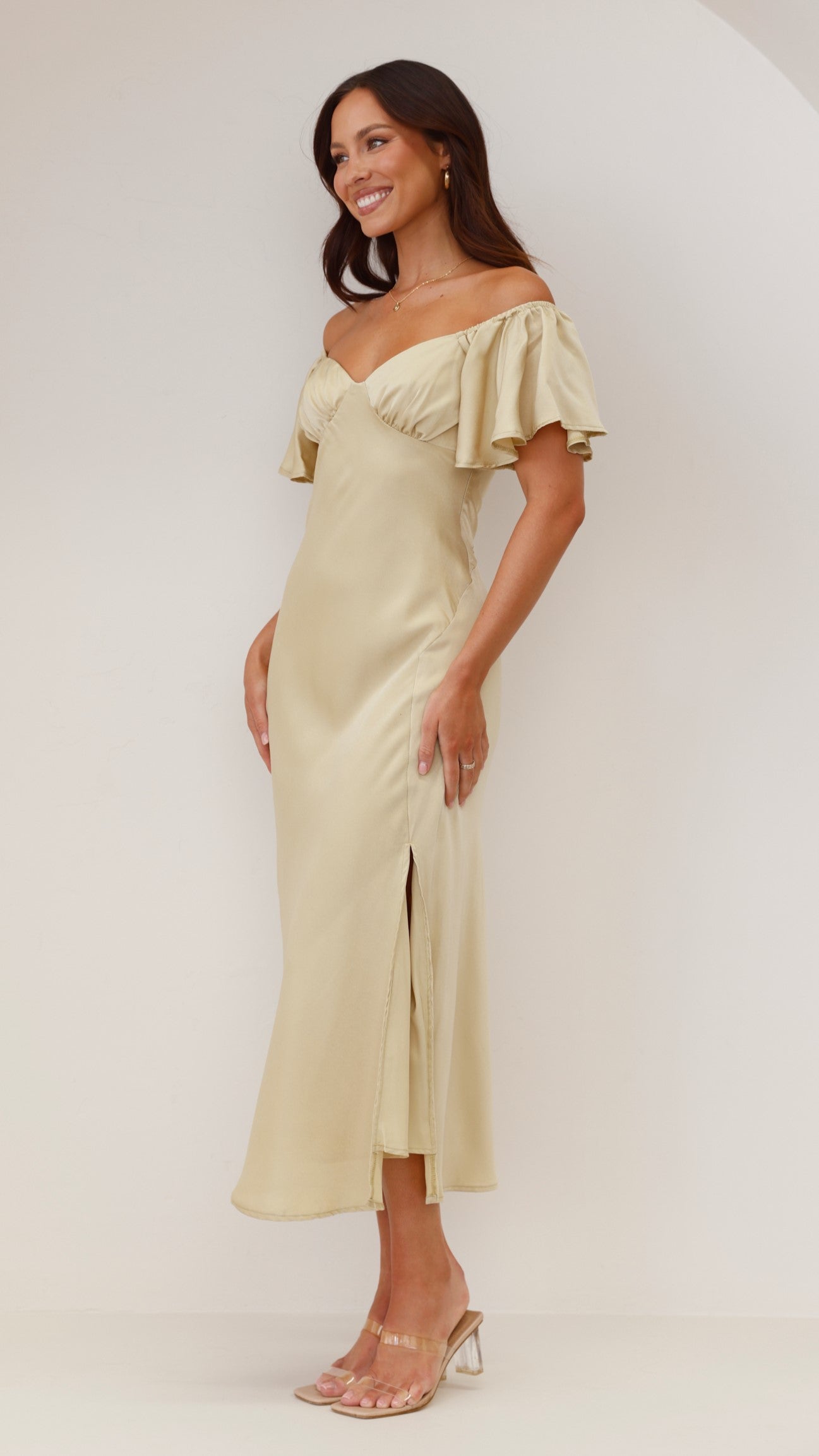 Cream off-shoulder ruffle midi dress with voluminous sleeves and side slit detail