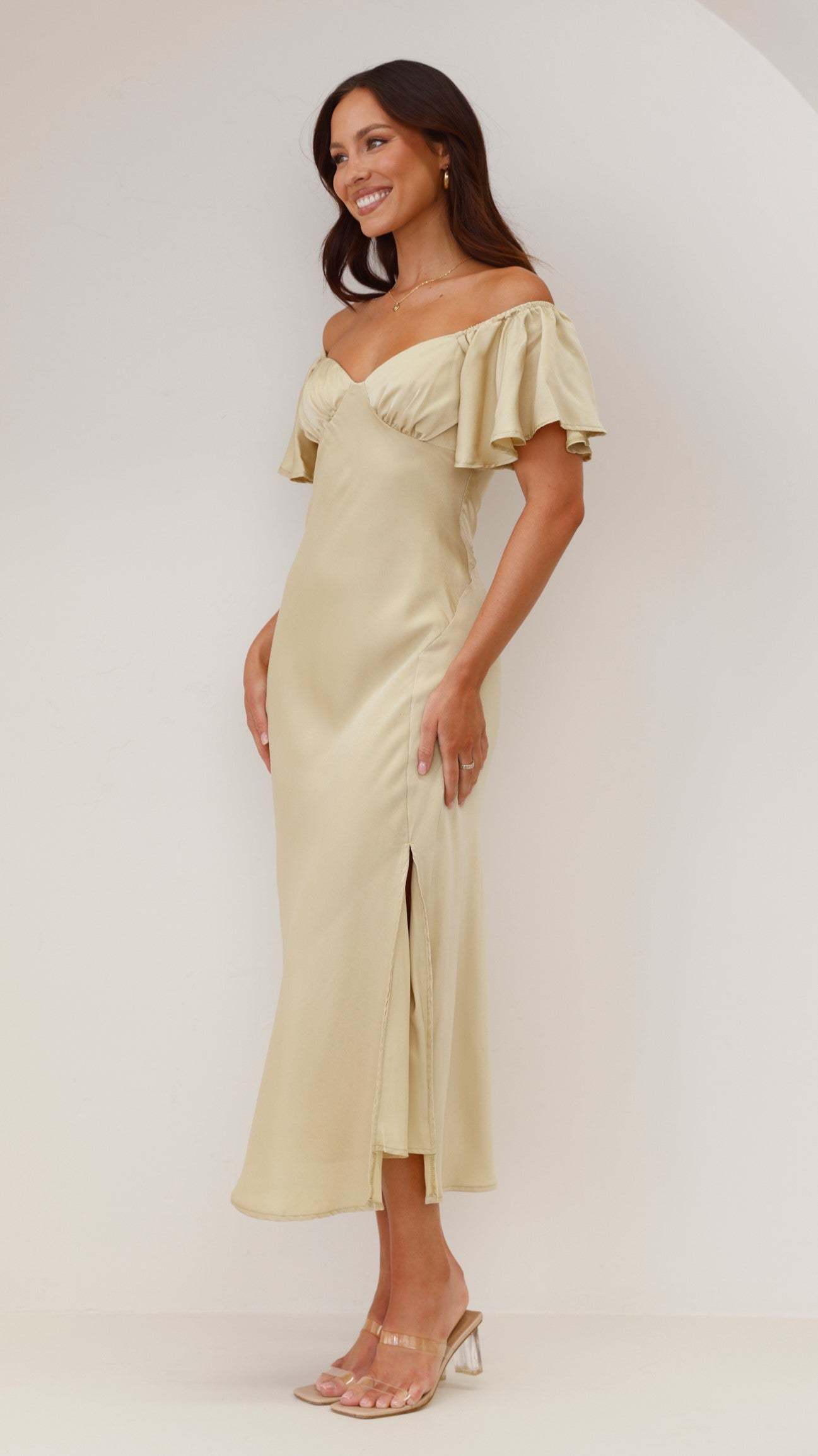 Cream off-shoulder ruffle midi dress with voluminous sleeves and side slit detail