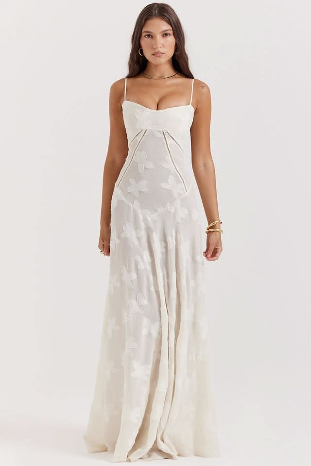 Cream lace maxi dress with sweetheart neckline and flowing skirt