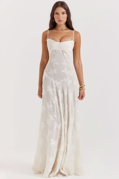 Cream lace maxi dress with sweetheart neckline and flowing skirt