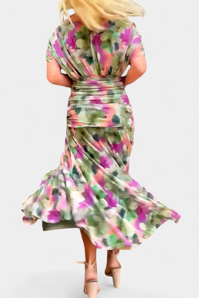 Rear view pink magenta floral ruched maxi dress flowing skirt