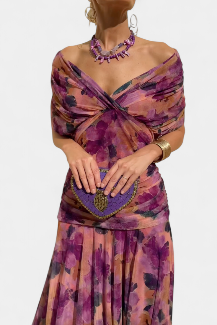 Purple floral ruched maxi dress with off-shoulder wrap neckline and draped sleeves